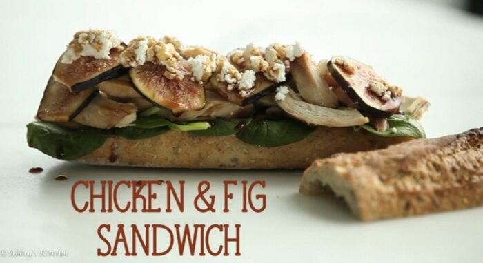 A sandwich with text overlay \"Chicken & Fig Sandwich.\"