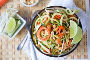 An overhead image of pad thai made with zucchini noodles.