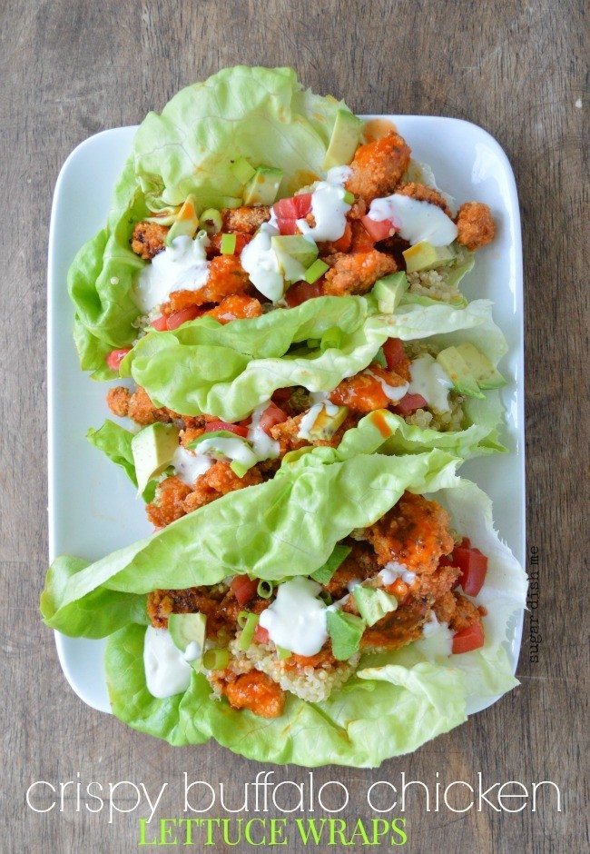 A white serving platter with buffalo chicken lettuce wrap.