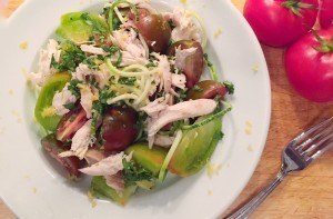 An overhead photo of a plate of zoodles with chicken.