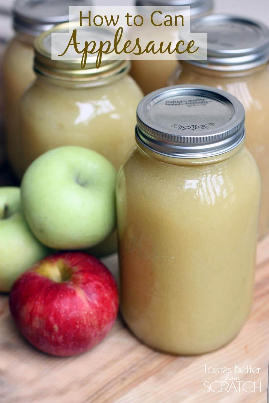 Mason jars of canned applesauce.