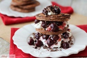 These crazy yummy stacked black forest chocolate protein pancakes are totally gluten free, low in fat and packed with high quality fermented whey protein.