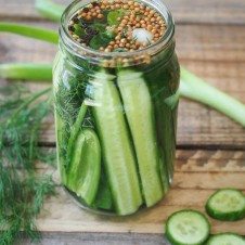 A jar of fermented pickles.