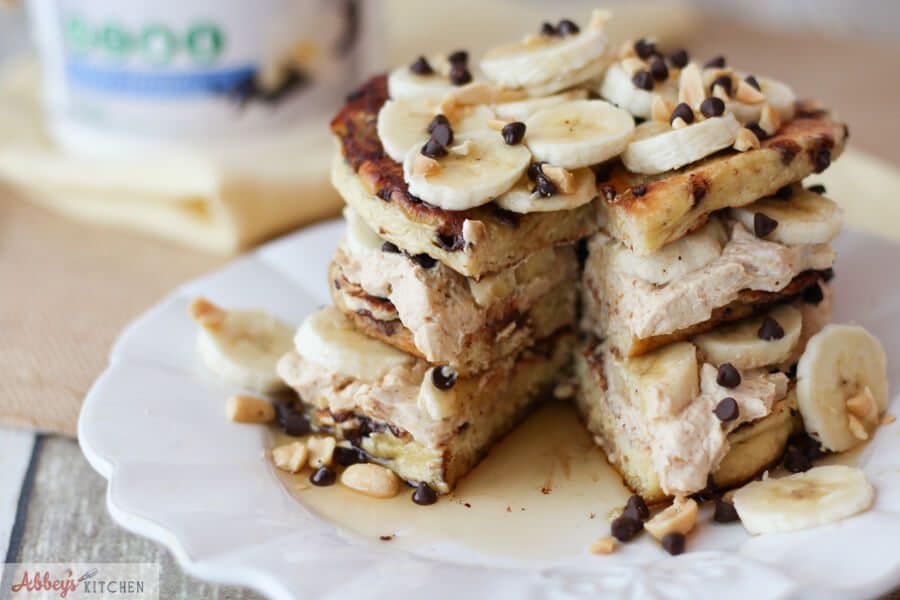 A stack of banana protein pancakes sliced opened.