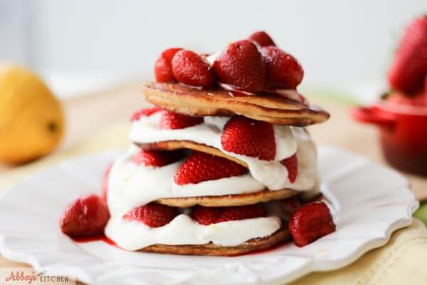 These decadent strawberry cheesecake stuffed layered protein pancakes are totally gluten free, low in fat and packed with high quality fermented dairy protein.
