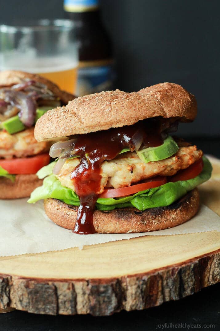 A BBQ chicken burger with caramelized onions.