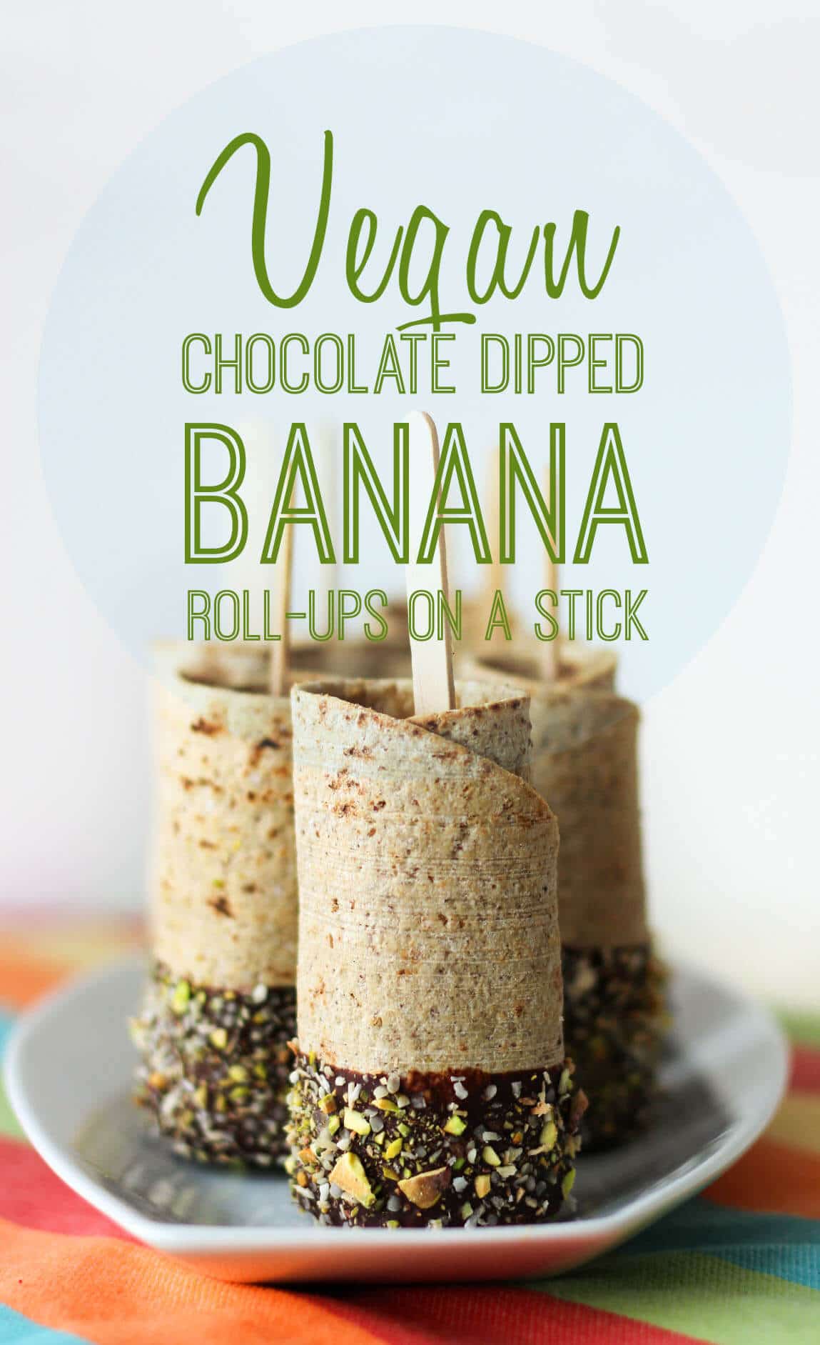 Pinterest image of a plate of multiple vegan chocolate dipped banana roll ups on a stick.