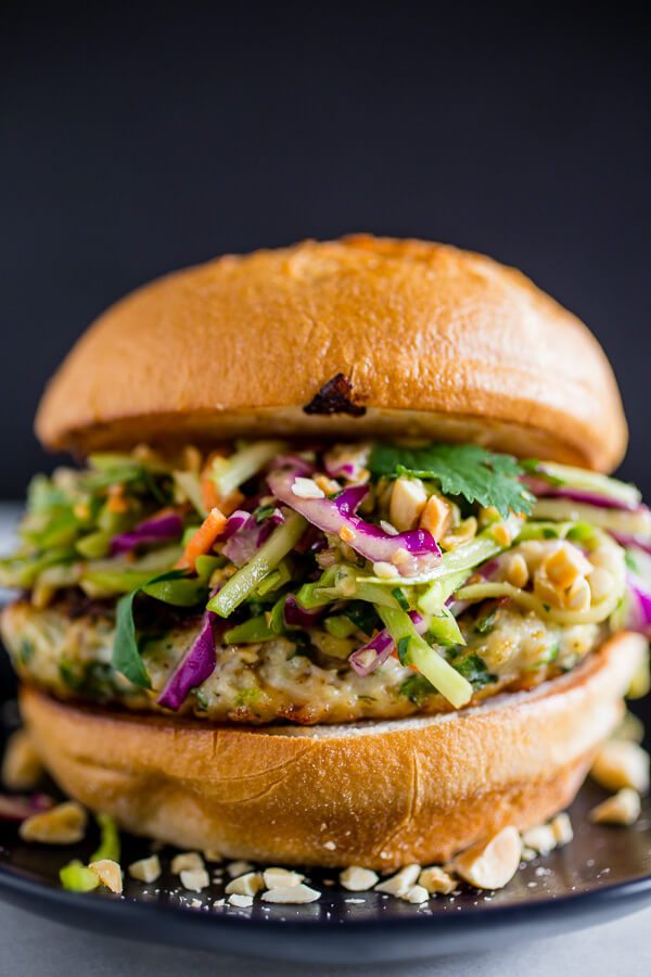 A close up of a thai chicken burger.