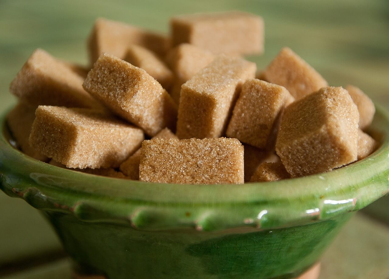 A bowl of brown sugar.