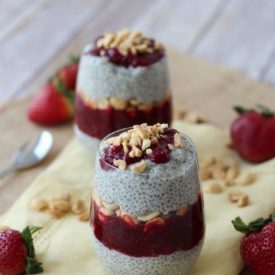 Two containers of peanut butter and jam vegan chia pudding.