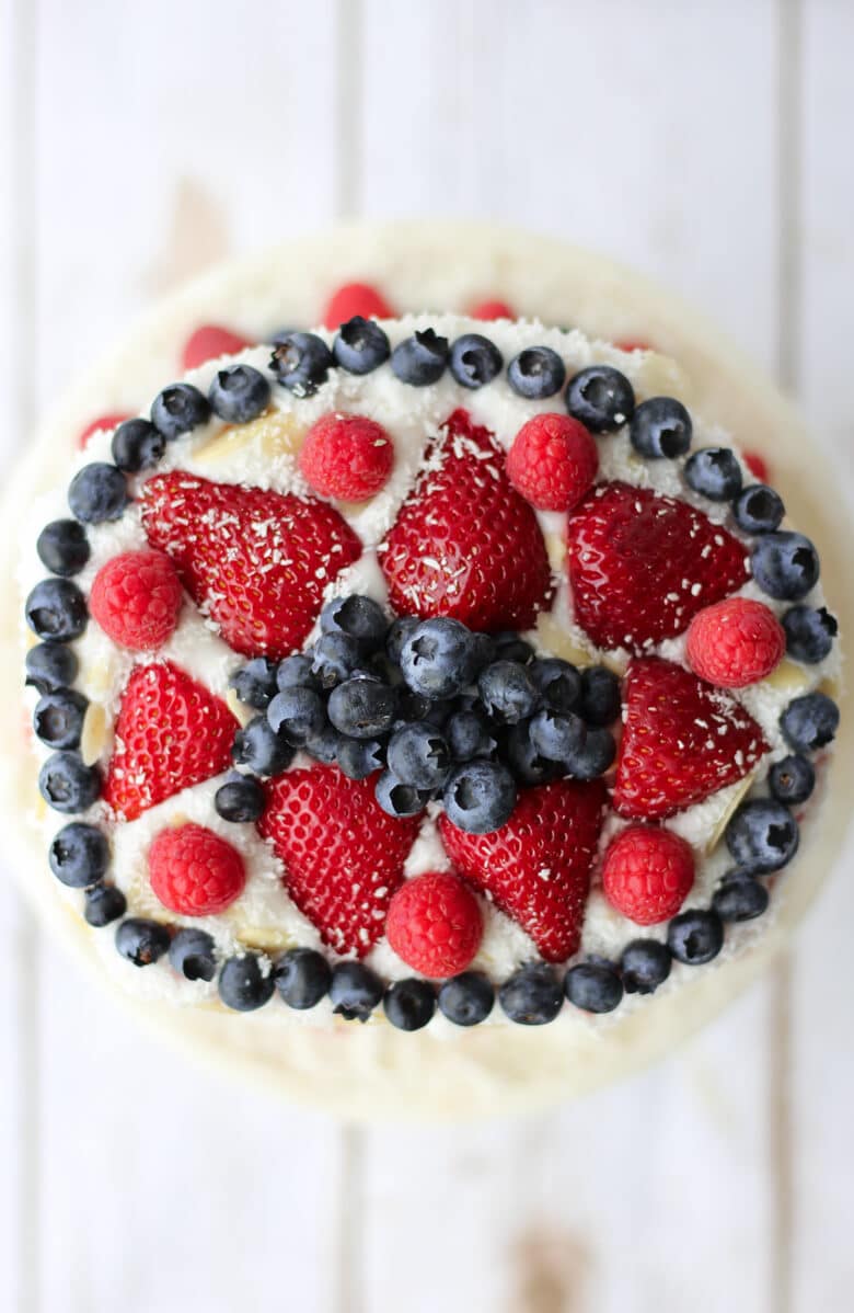 watermelon cake topped with mixed berries.