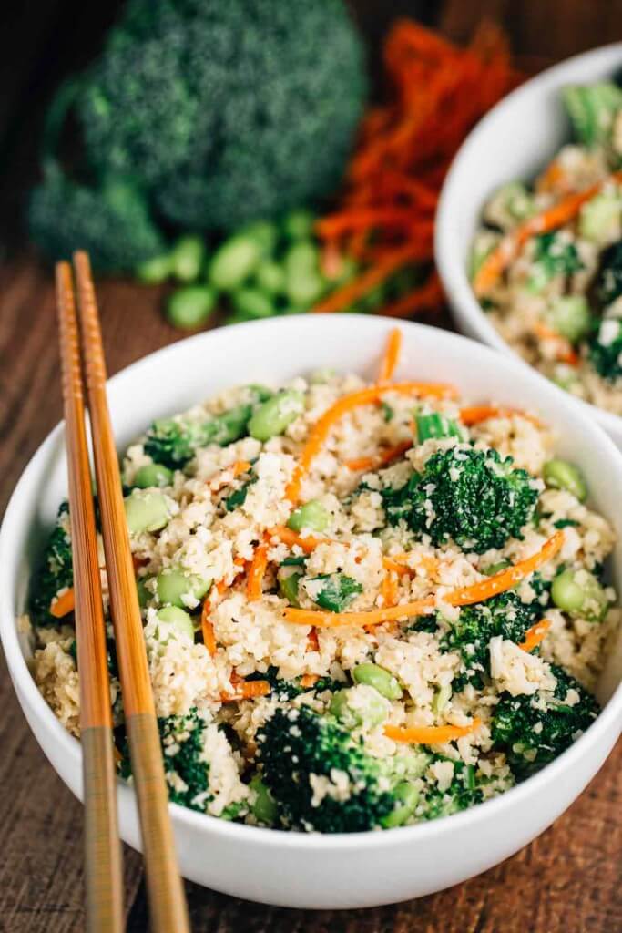 A white bowl cauliflower rice stir fry bowl.