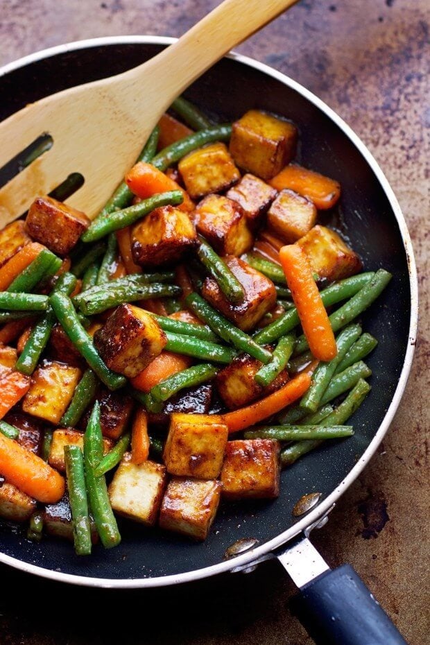 A pan with sesame ginger tofu with vegetables.