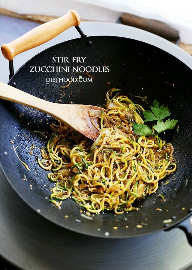 A wok with stir fry zucchini noodles.