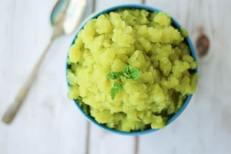 birds eye view of vegan and gluten free Cucumber Lime Granita topped with mint