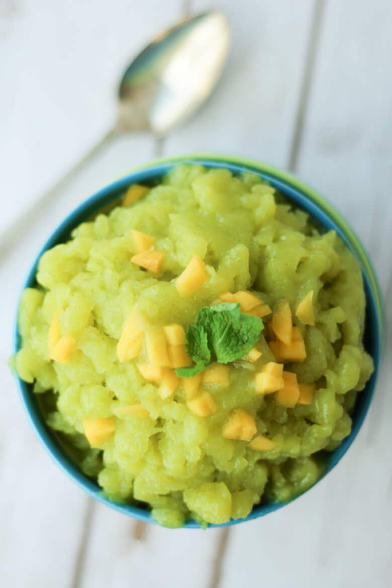 close up of Cucumber Lime Granita topped with spicy mango and mint