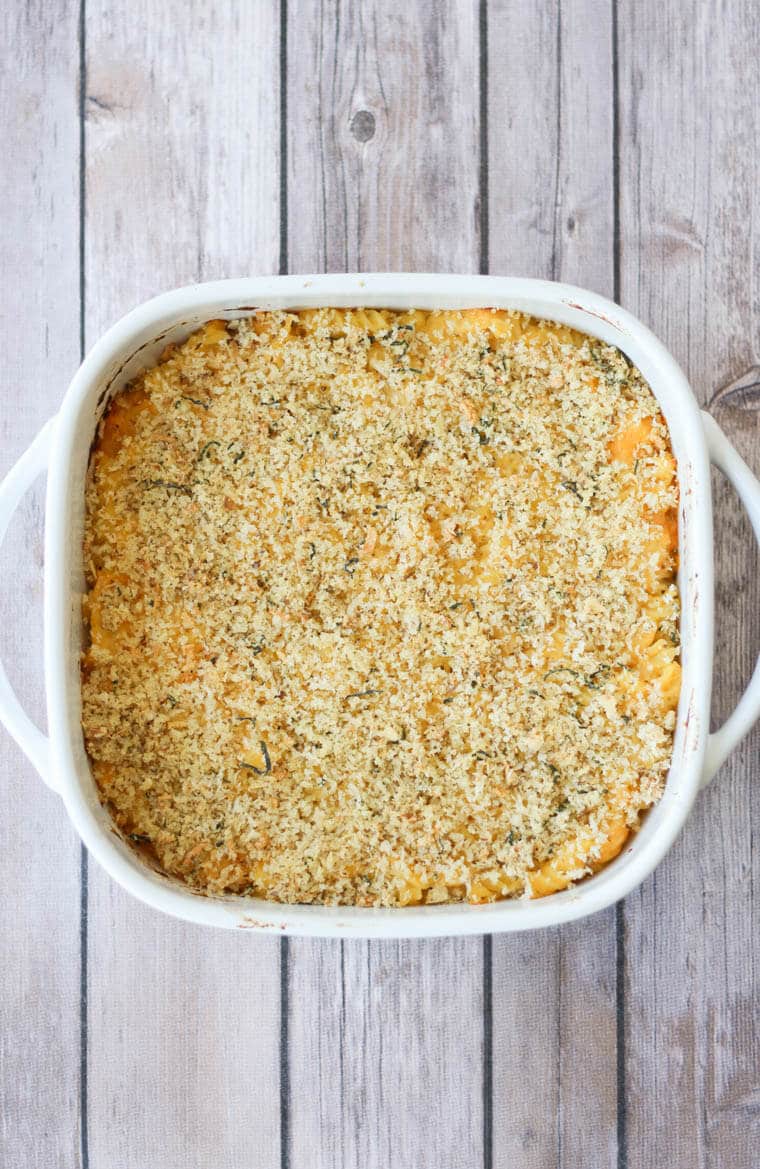 Birds eye view of healthy vegetable mac and cheese in a white casserole dish.