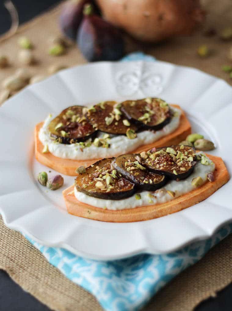 A sweet potato toast with sliced figs and yogurt on top.