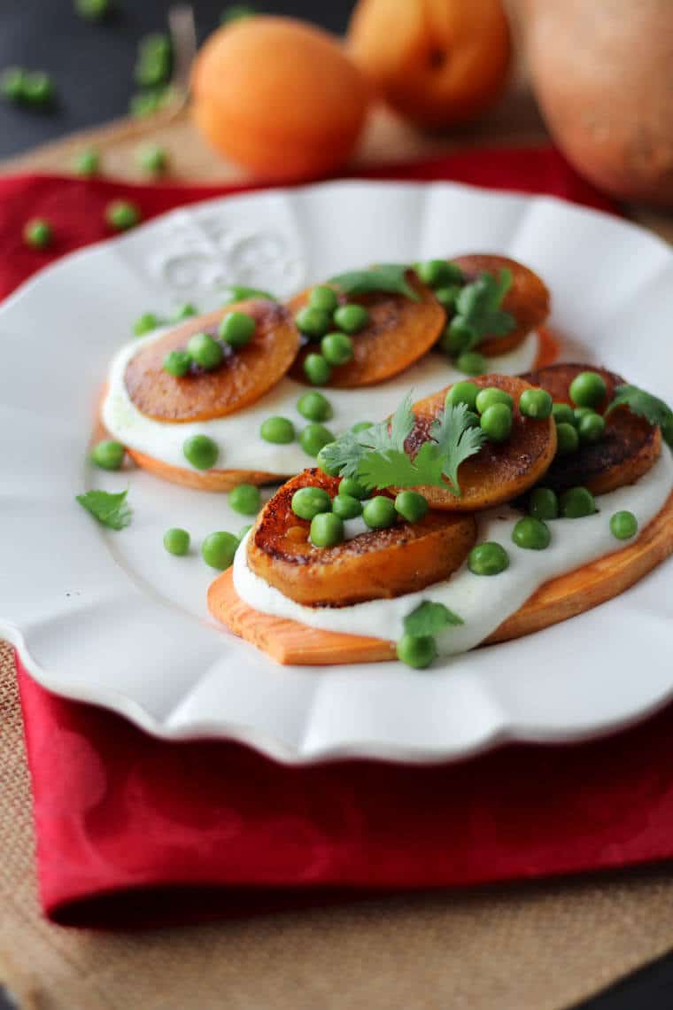 A sweet potato toast with Indian curried apricots and peas.