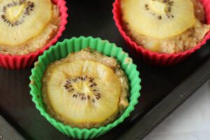 These tropical baked oatmeal muffin cups are gluten free, dairy free and low in fat! The perfect make-ahead on-the-go breakfast!