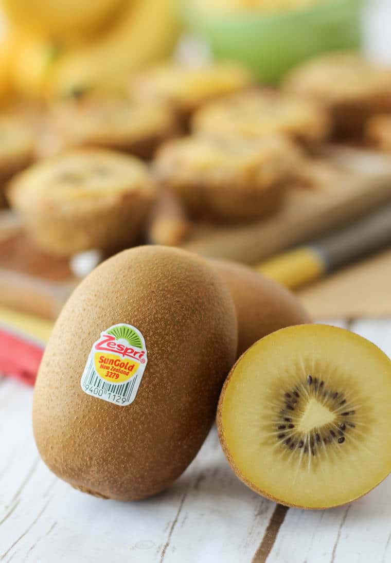 A close up of two kiwi, one cut opened.