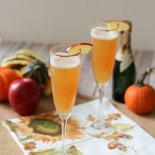 Two flutes of holiday cocktails.