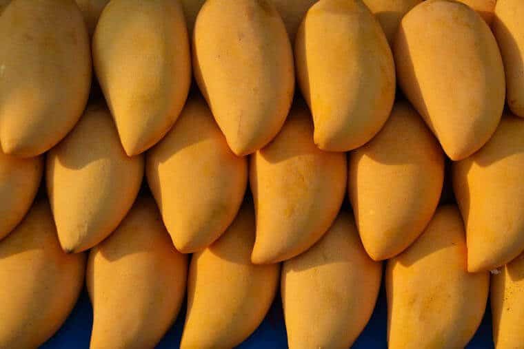 A close up of a pile of fruit.