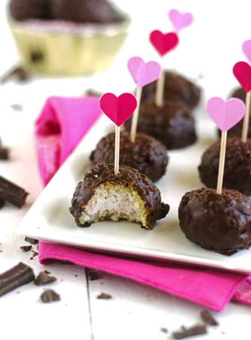 A plate of quinoa bites with a chocolate glaze.