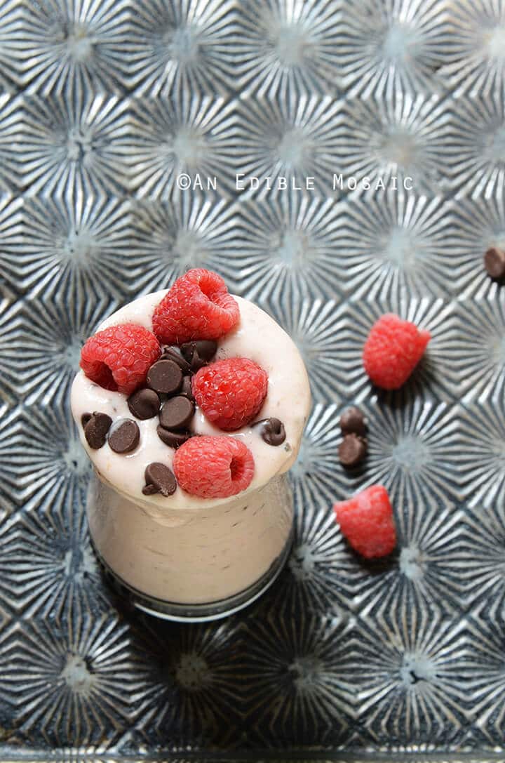 A glass of skinny raspberry chocolate cheesecake milkshake.