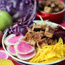 An angled image of a poke bowl with crispy tofu.