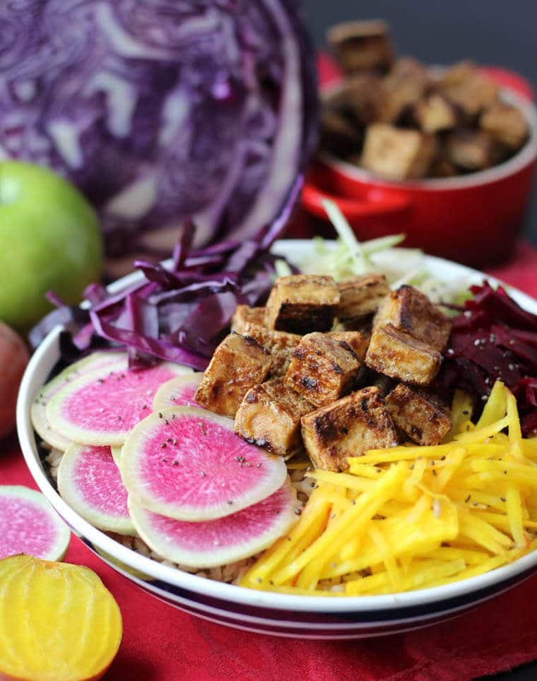 An angled image of a poke bowl with crispy tofu.