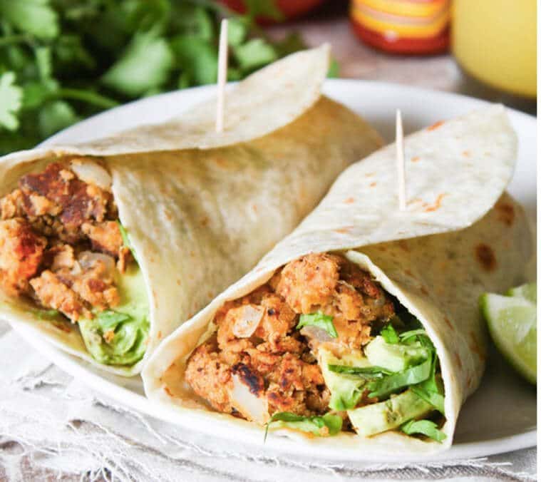 A plate chickpea breakfast burritos.