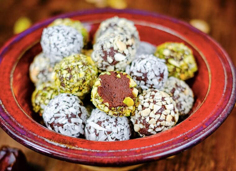 A bowl of luscious date avocado chocolate truffles. 