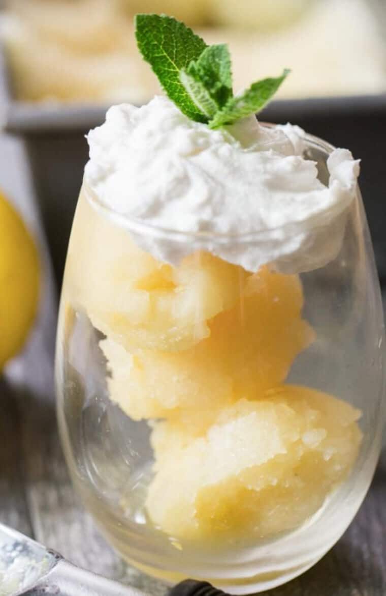 A glass cup of paleo lemon sorbet. 