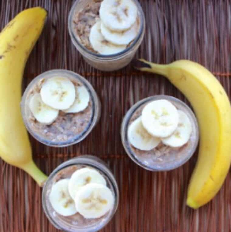 An overhead photo of four peanut butter banana overnight oats.