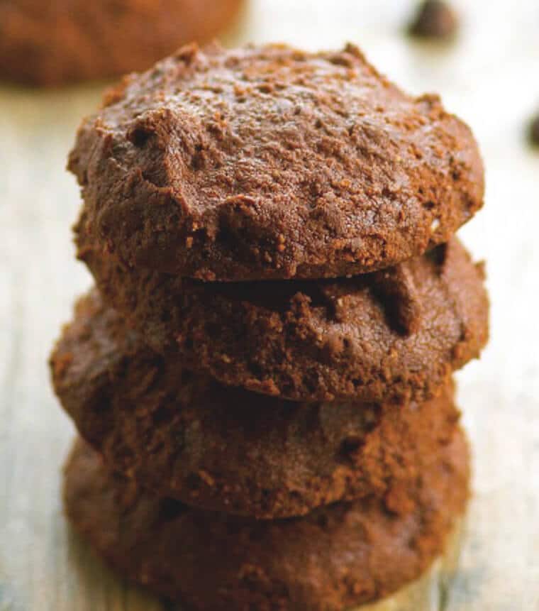 A stack of vegan flourless chocolate cookies.