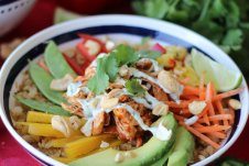 A bowl of paleo cauliflower rice chicken burrito bowl.