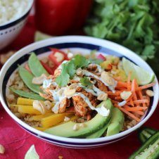 A bowl of paleo cauliflower rice chicken burrito bowl.