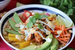 A bowl of paleo cauliflower rice chicken burrito bowl.