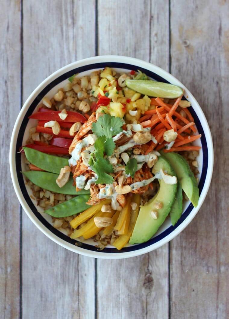 An overhead photo of a bowl of cauliflower rice burrito bowl.