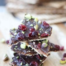 An angled image of a stack of passover matzo brittle with salted coconut sugar caramel.