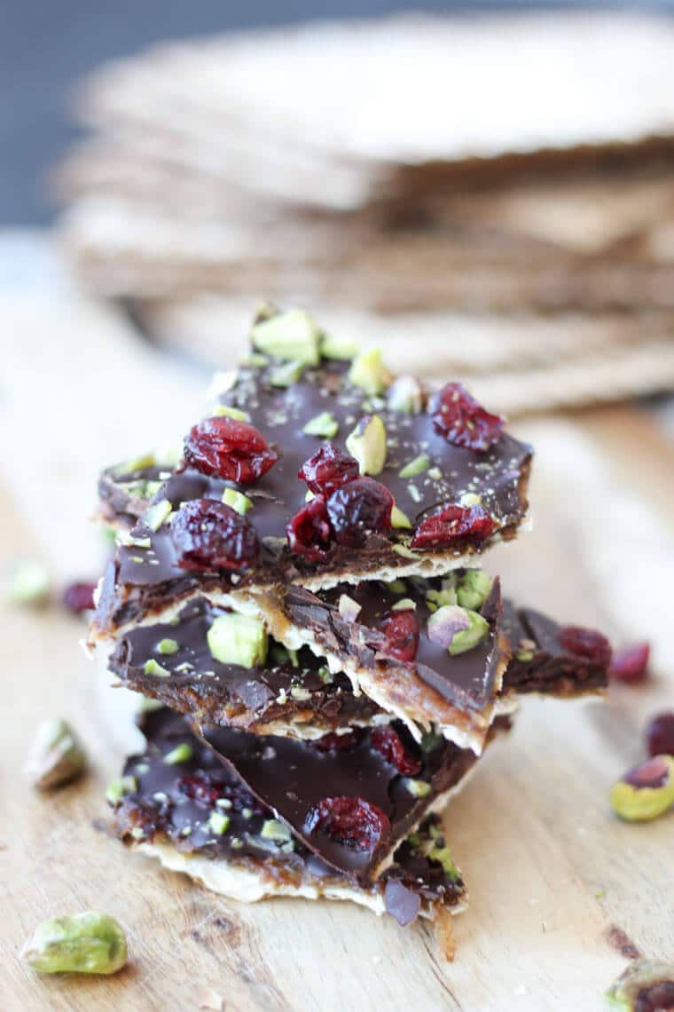 An angled image of a stack of passover matzo brittle with salted coconut sugar caramel.