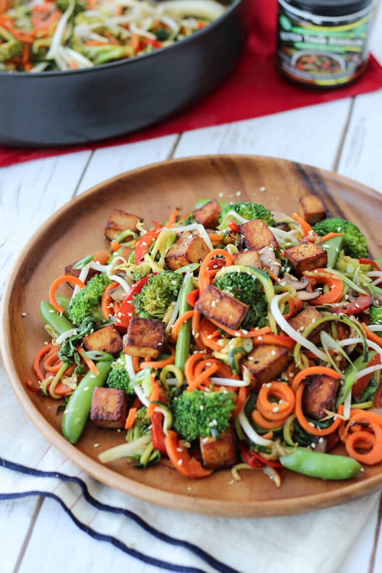 Stir fry on a wooden plate.