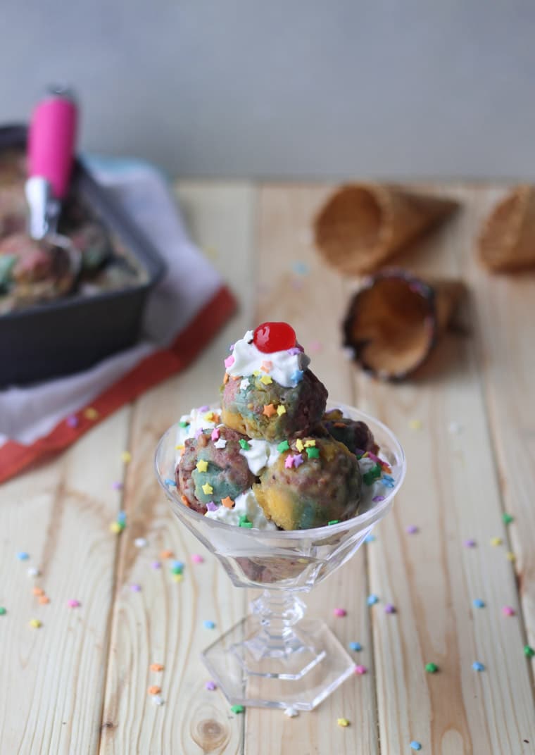 Unicorn nice cream sundae in a glass dish.