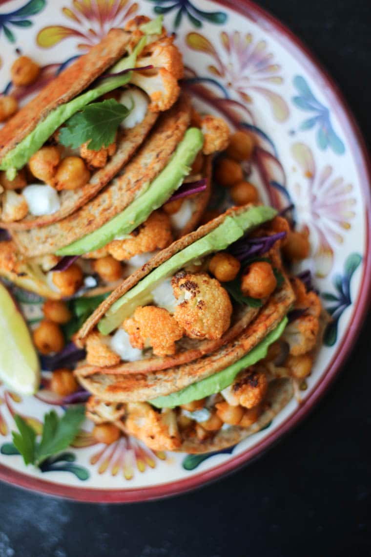 birds eye view of a vegan meal on a multi colour plate