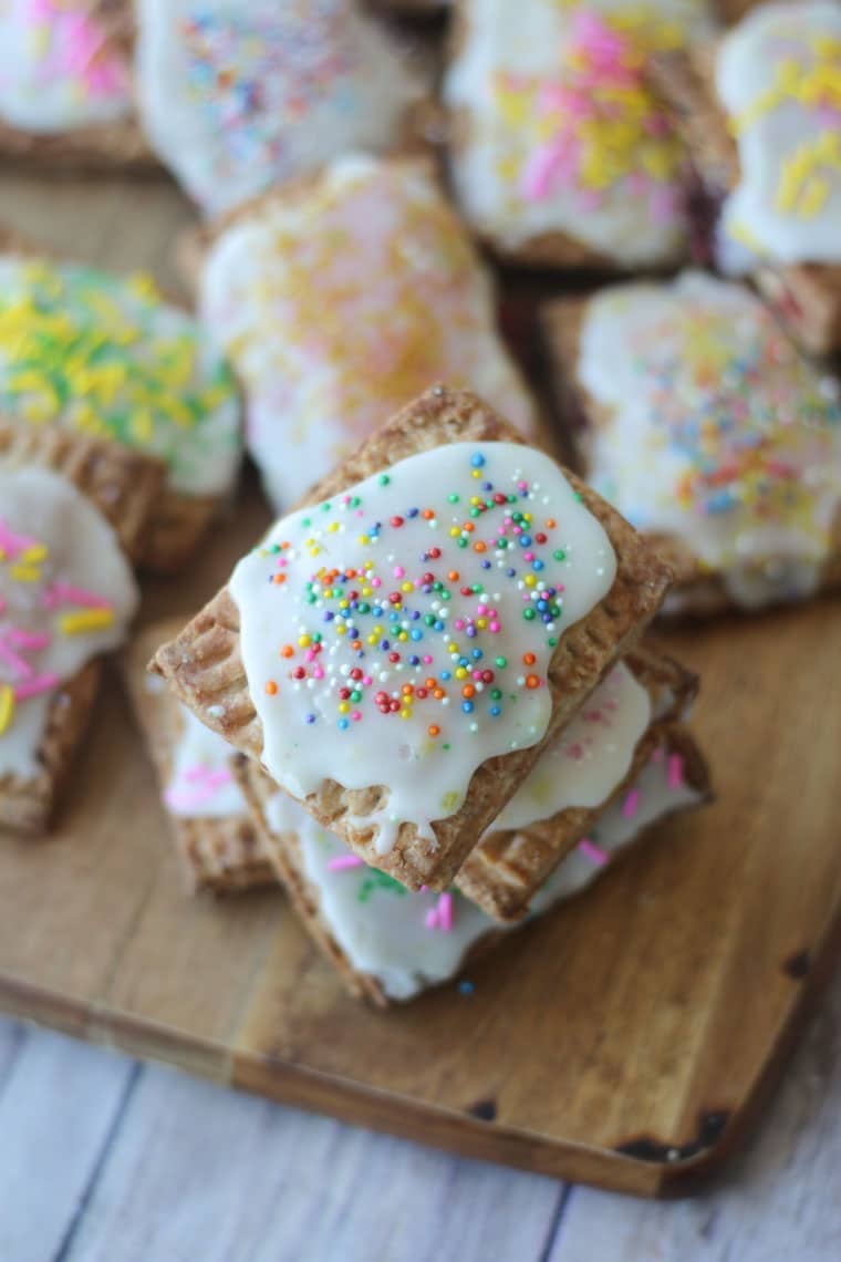 Homemade pop tarts topped with icing and sprinkles