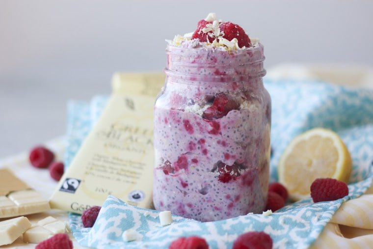 A mason jar containing white chocolate, lemon, raspberry overnight oats.