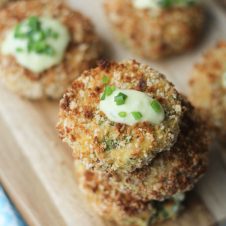 These gluten free cheese stuffed fish cakes with aged cheddar sauce will quickly become your go-to healthy appetizer or dinner.