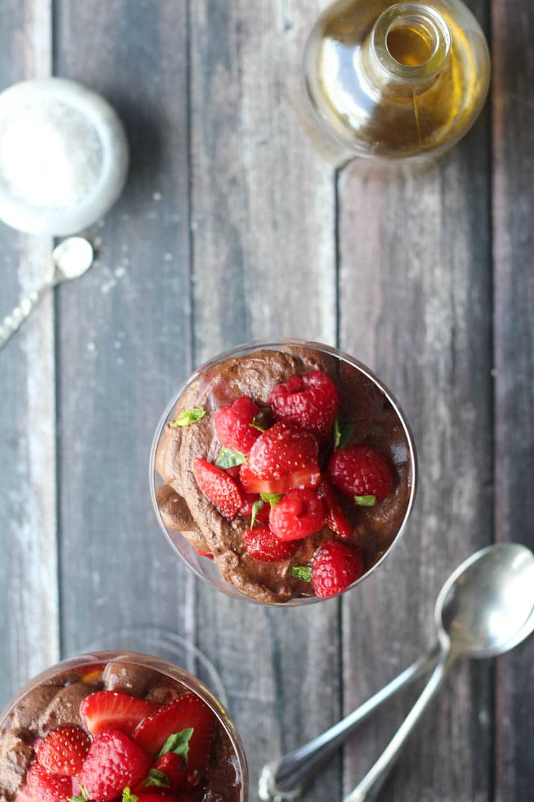 birds eye view of chocolate olive oil mousse topped with macerated berries