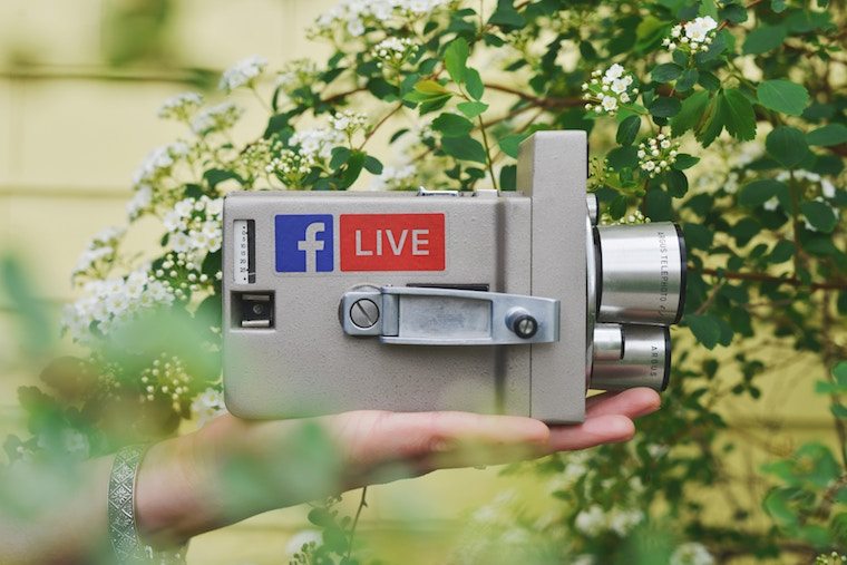 hand holding a video camera